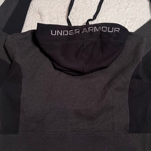 Women’s under Armour crop sweater. Like new. Black and gray. Size large.